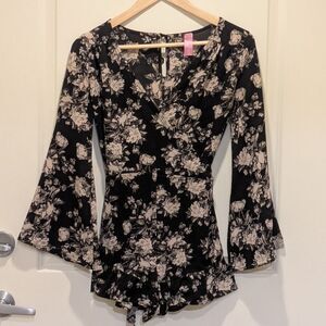 EUC Blushing Heart S Black and Grey Rose Print Ruffle Bottom Romper